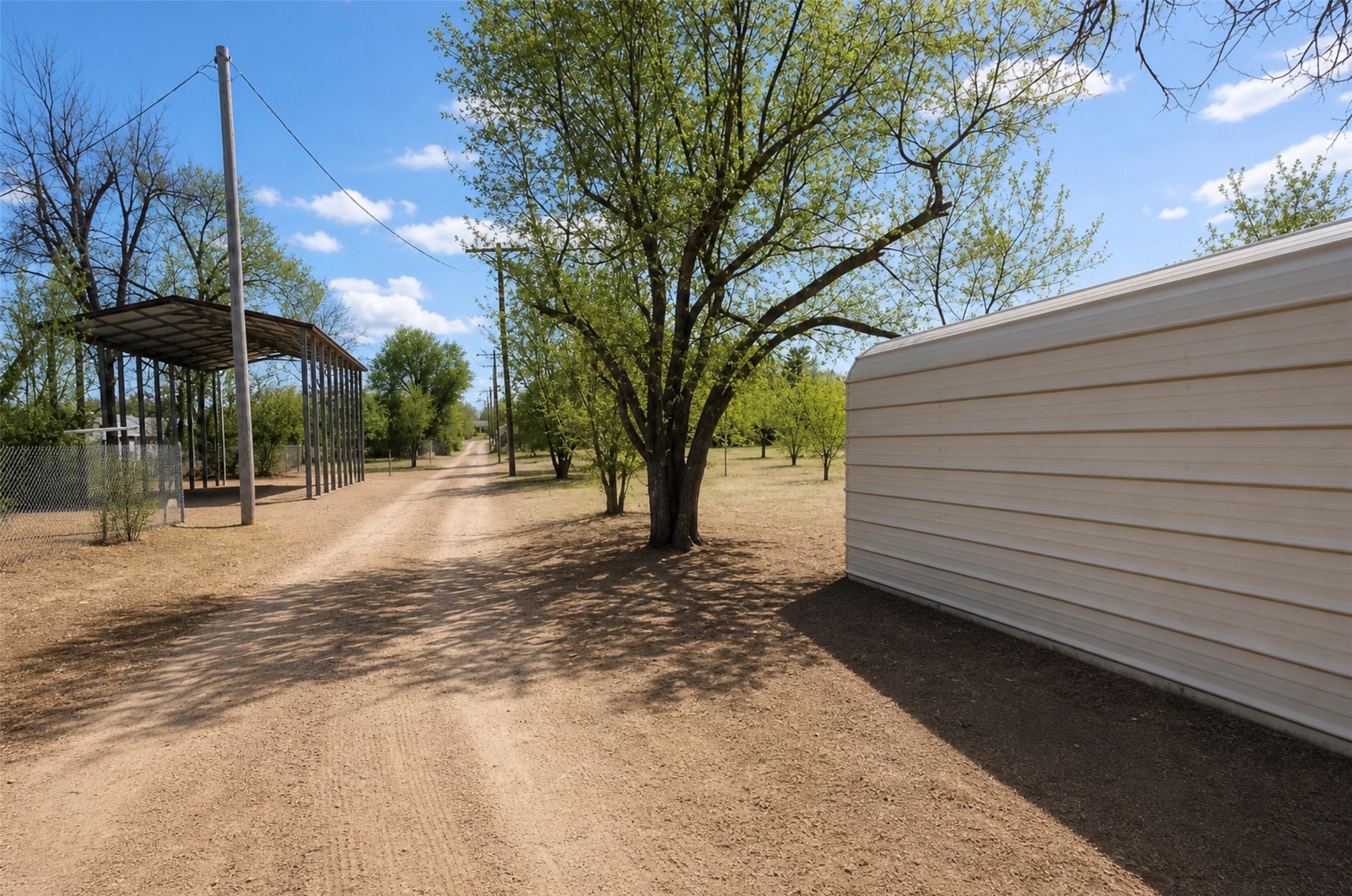 419 Fifth Street McLean, TX 79057 - Photo 7 of 34 a view of a backyard with sitting area