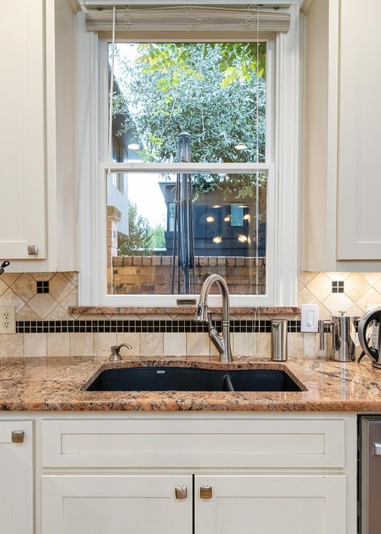 902 West 18th Street, Unit B Austin, TX 78701 - Photo 11 of 39 Kitchen with stainless appliances, granite counters and ample storage