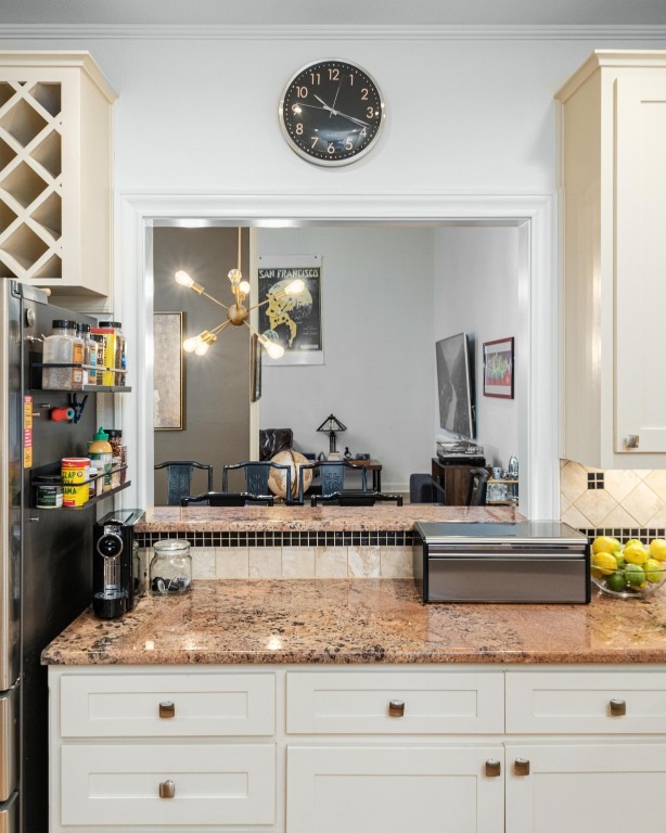 902 West 18th Street, Unit B Austin, TX 78701 - Photo 12 of 39 Breakfast bar window to the dining area