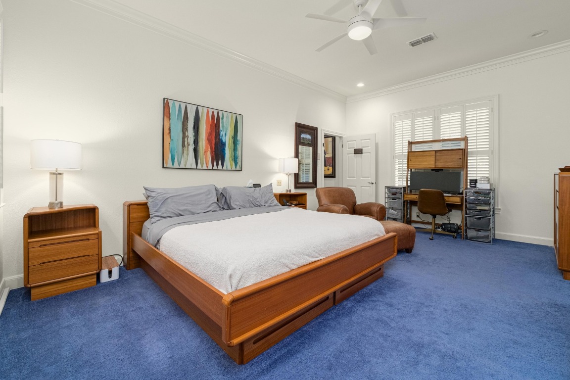 902 West 18th Street, Unit B Austin, TX 78701 - Photo 22 of 39 Primary bedroom with shutters, high ceilings, recessed lighting, freshly painted.
