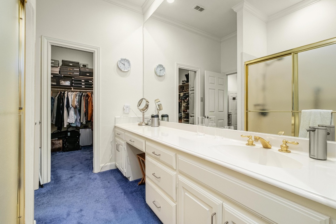 902 West 18th Street, Unit B Austin, TX 78701 - Photo 26 of 39 Primary bathroom with ample storage and a getting ready counter