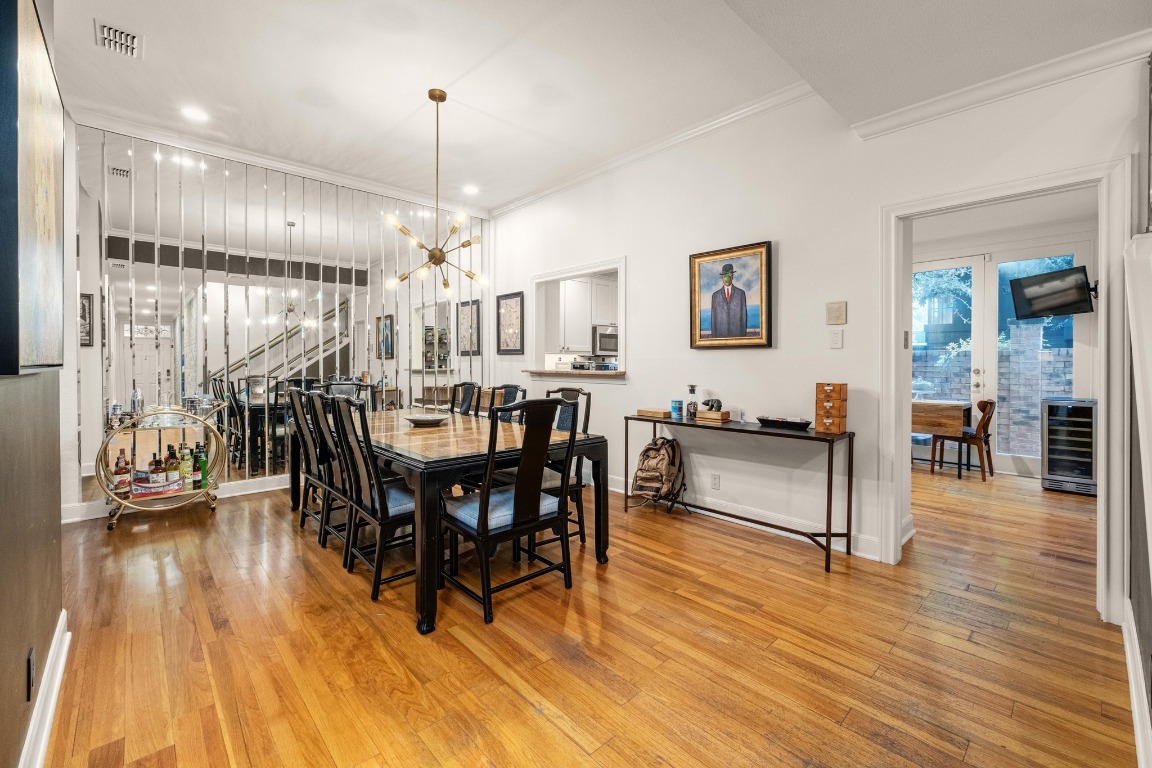 902 West 18th Street, Unit B Austin, TX 78701 - Photo 5 of 39 Dining Area with a stylish chandelier