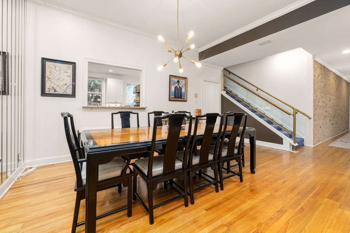902 West 18th Street, Unit B Austin, TX 78701 - Photo 6 of 39 Dining Area with a stylish chandelier
