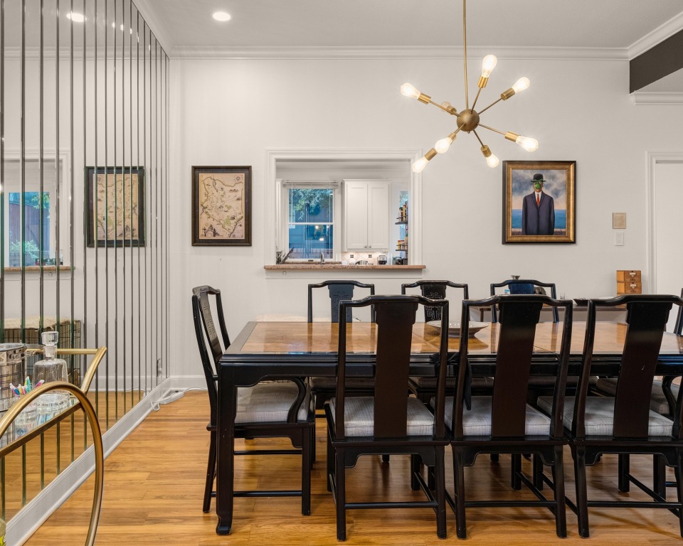 902 West 18th Street, Unit B Austin, TX 78701 - Photo 7 of 39 Dining Area with a stylish chandelier