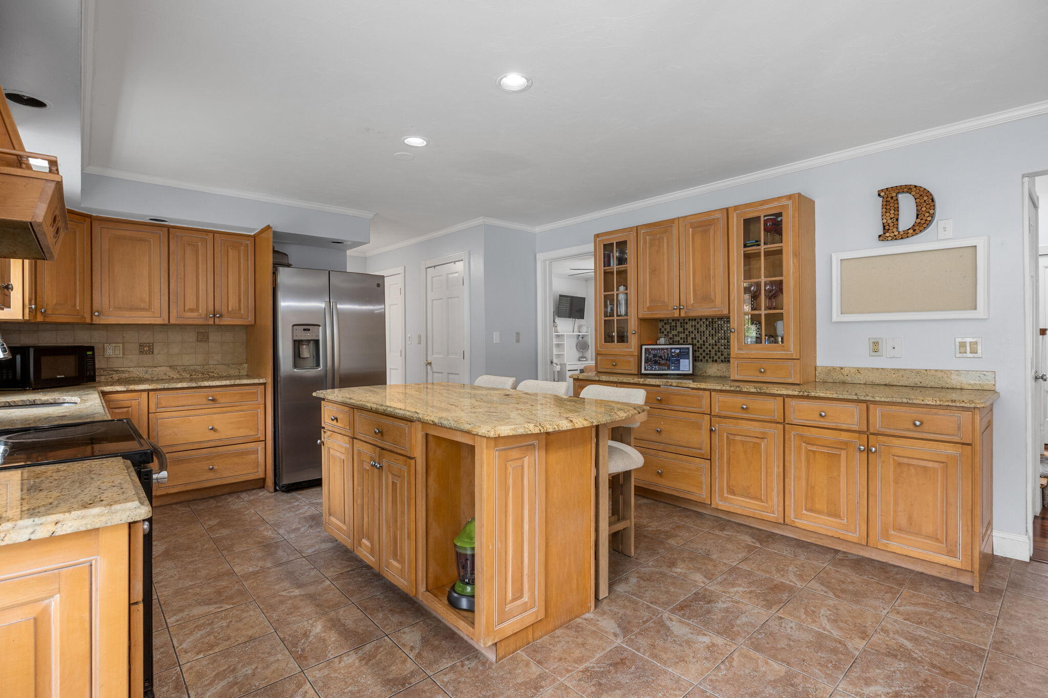 4 Knob Lane Buzzards Bay, MA 02532 - Photo 15 of 52 a kitchen that has a lot of white cabinets and stainless steel appliances