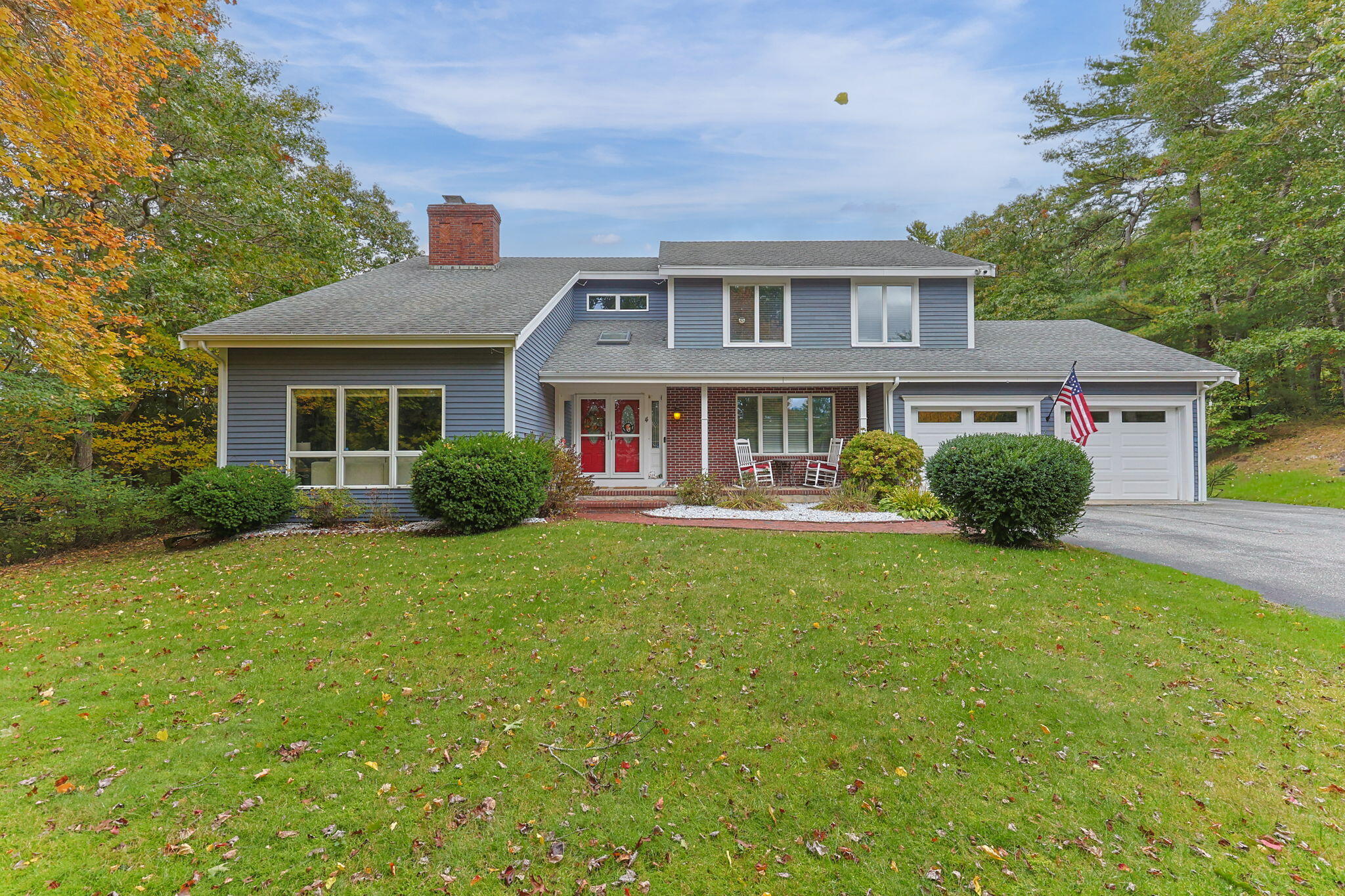 4 Knob Lane Buzzards Bay, MA 02532 - Photo 2 of 52 a front view of a house with a yard