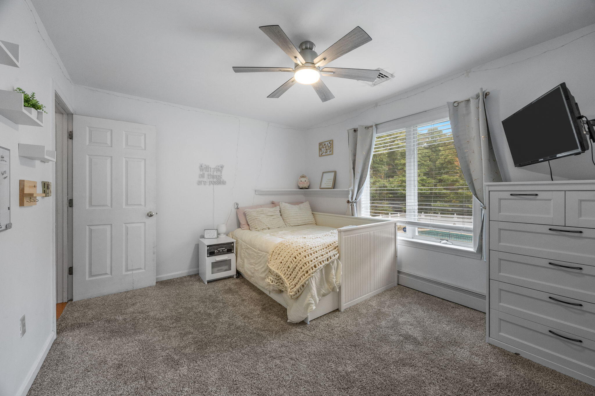 4 Knob Lane Buzzards Bay, MA 02532 - Photo 28 of 52 a room with a bed and flat screen tv