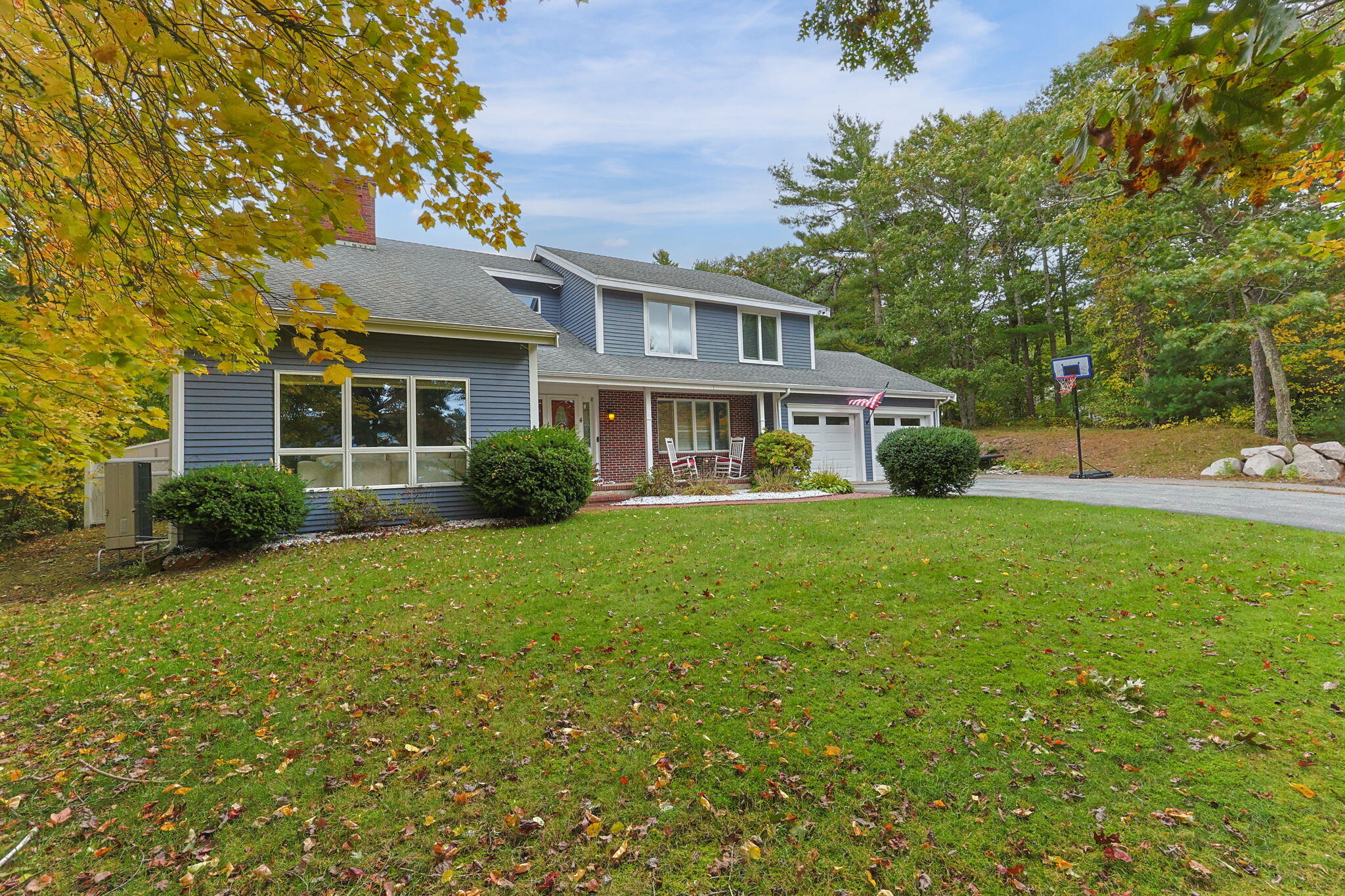 4 Knob Lane Buzzards Bay, MA 02532 - Photo 3 of 52 a front view of a house with garden