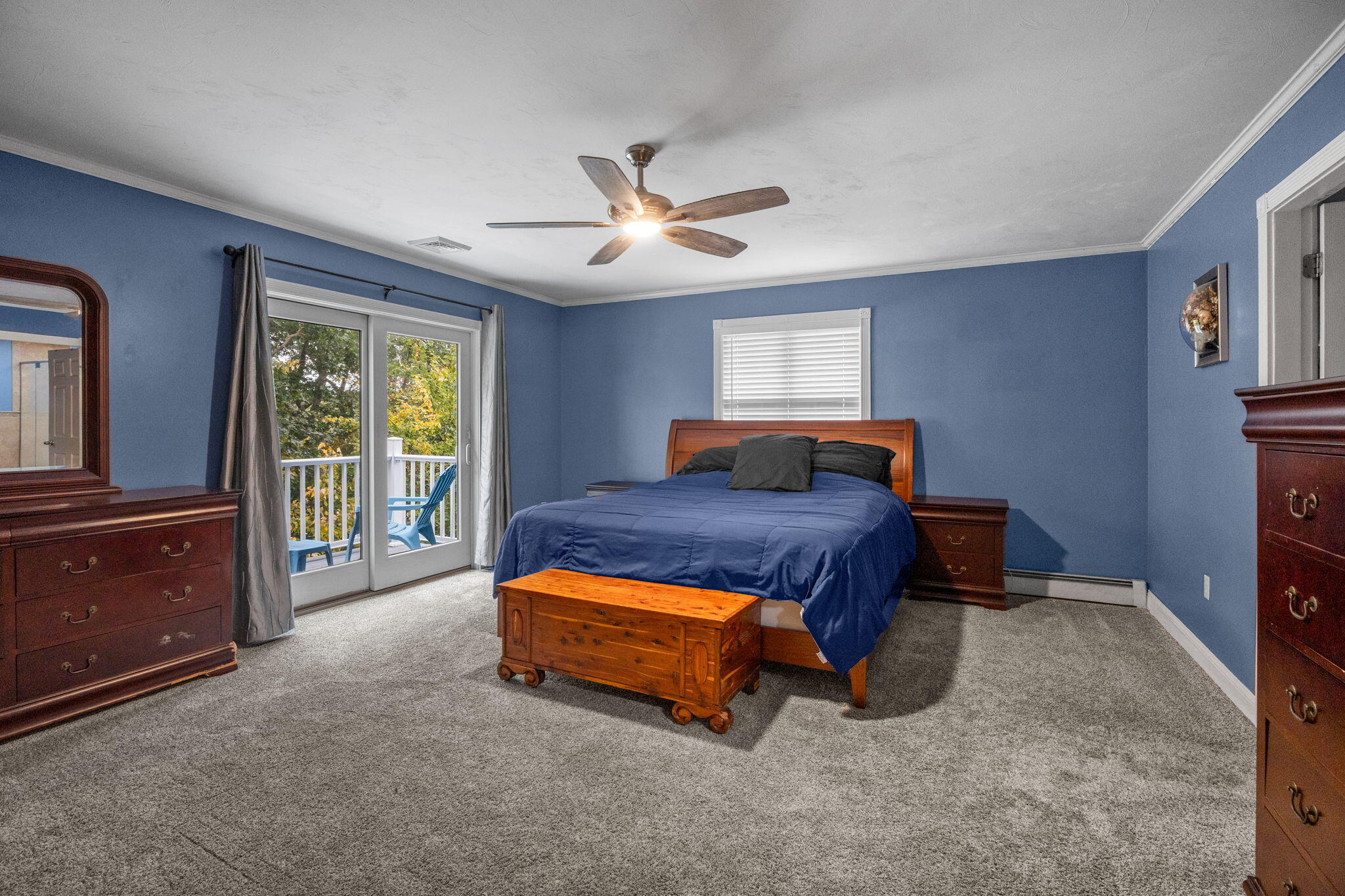 4 Knob Lane Buzzards Bay, MA 02532 - Photo 32 of 52 a bedroom with a bed and a dresser next to a window