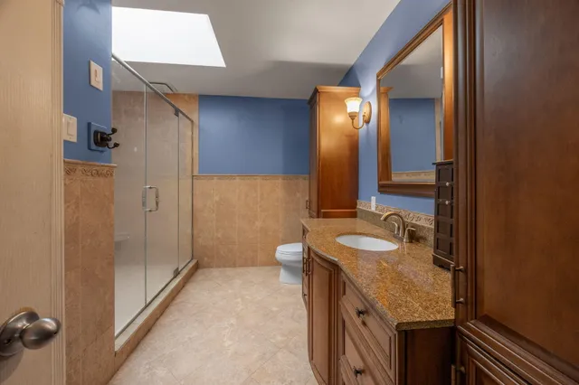 a view of a balcony with wooden floor