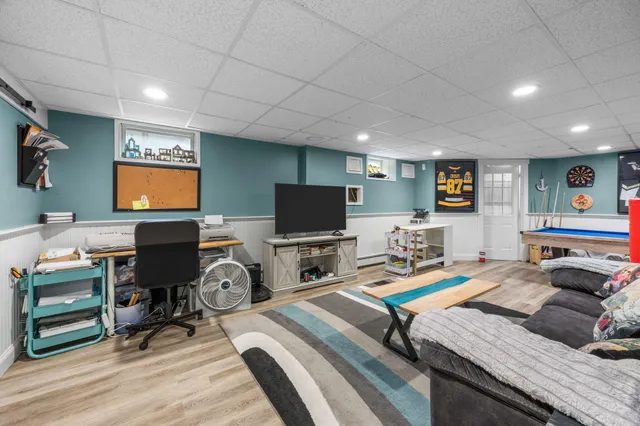 a room with furniture and a wooden floor