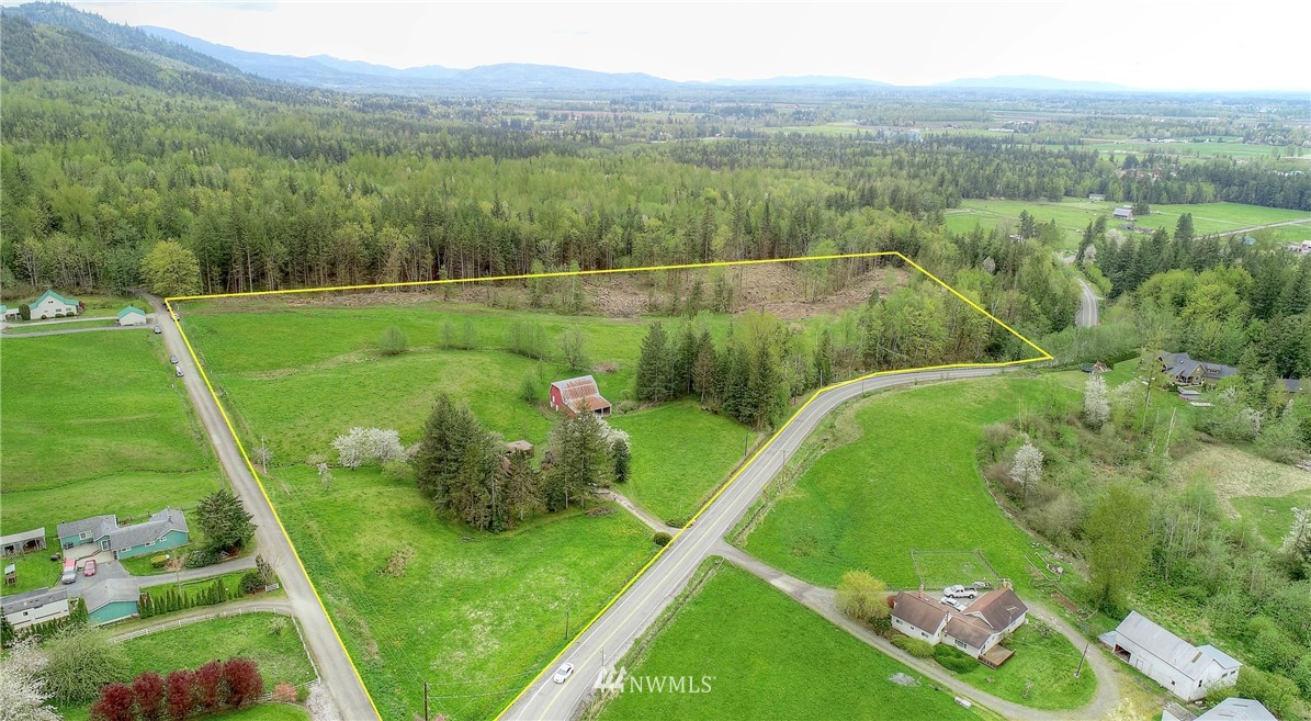 4079 South Pass Road Everson, WA 98247 - Photo 1 of 35 a view of a garden with a lake