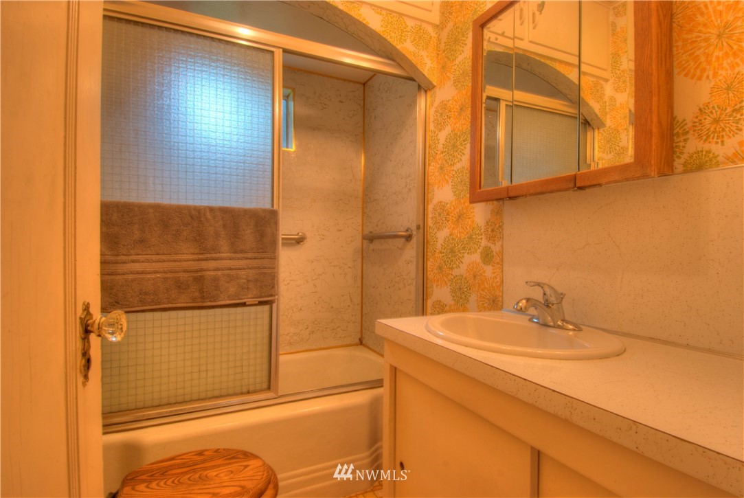 4079 South Pass Road Everson, WA 98247 - Photo 12 of 35 a bathroom with a sink and a mirror
