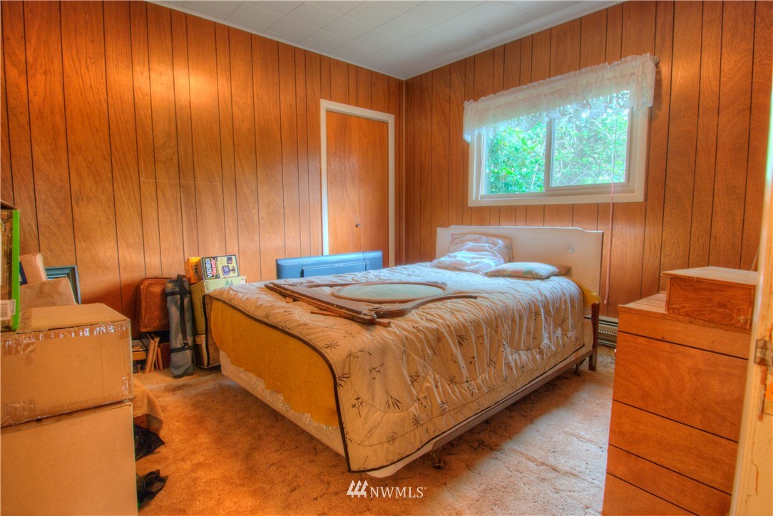 4079 South Pass Road Everson, WA 98247 - Photo 13 of 35 a bedroom with a bed and a dresser next to a window