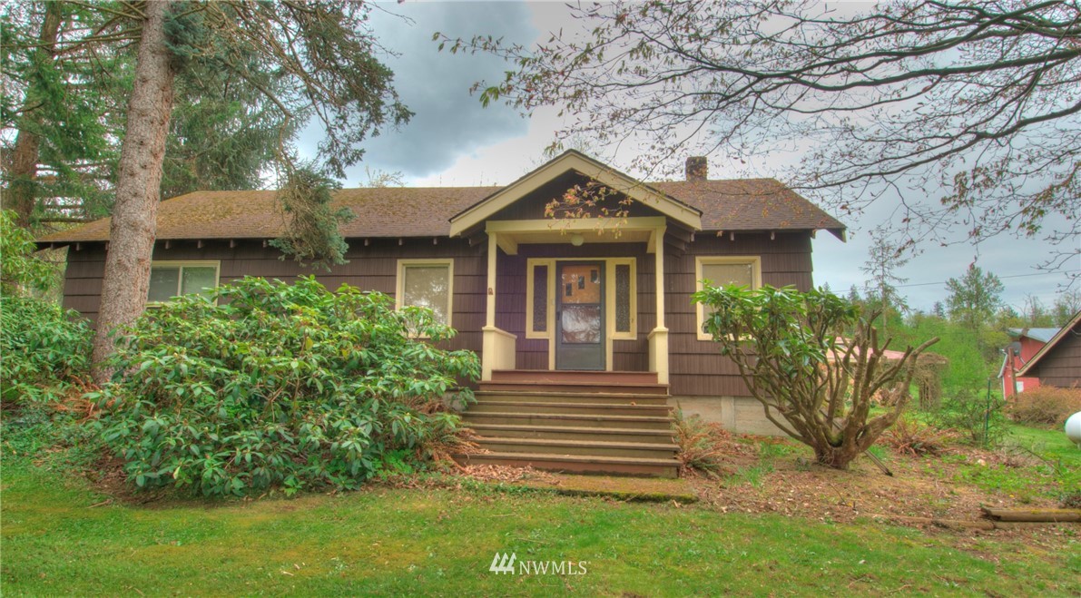 4079 South Pass Road Everson, WA 98247 - Photo 5 of 35 a front view of a house with a garden