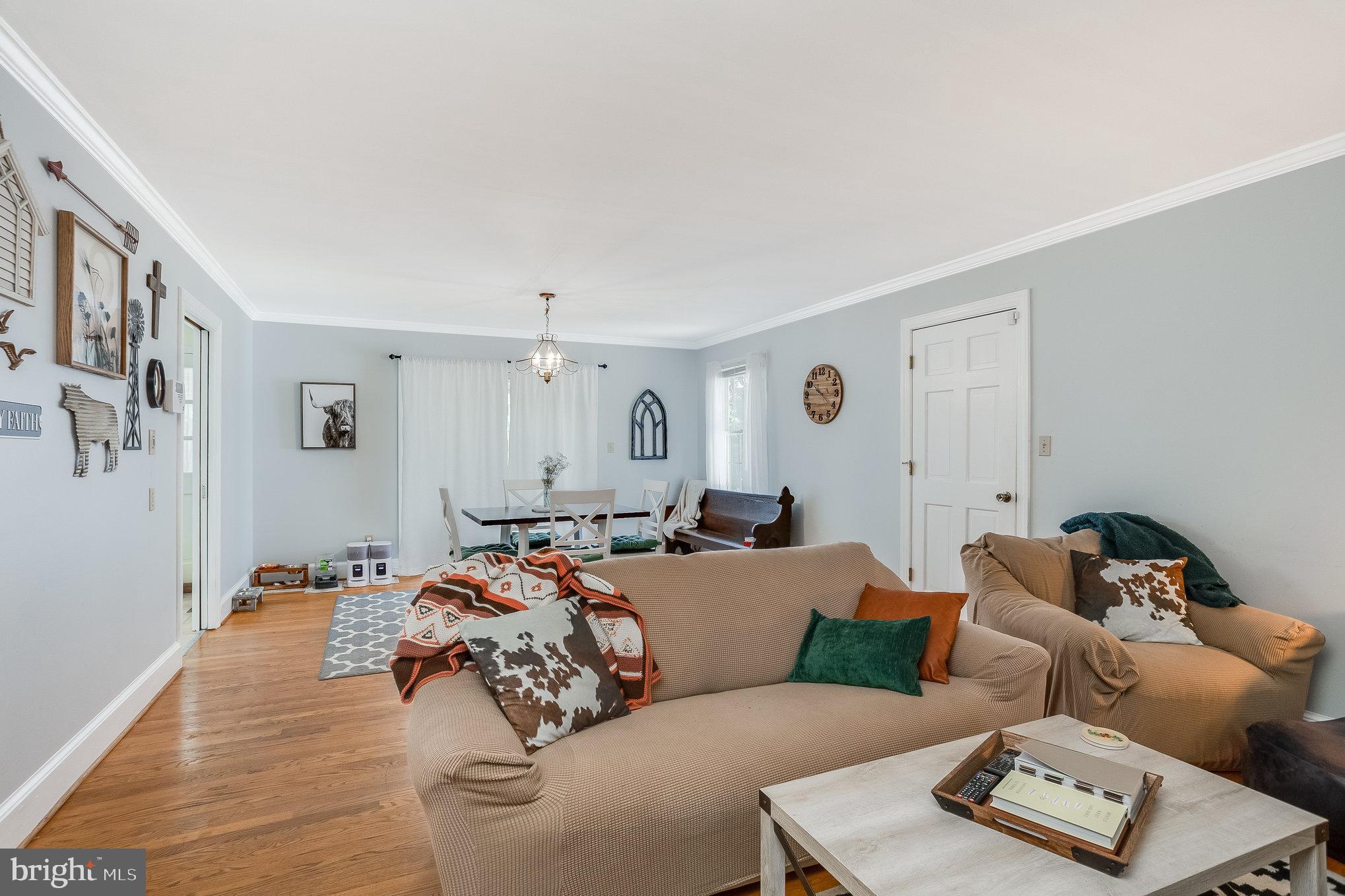 7373 Baldwin Ridge Road Warrenton, VA 20187 - Photo 12 of 13 Living Room with door access to garage