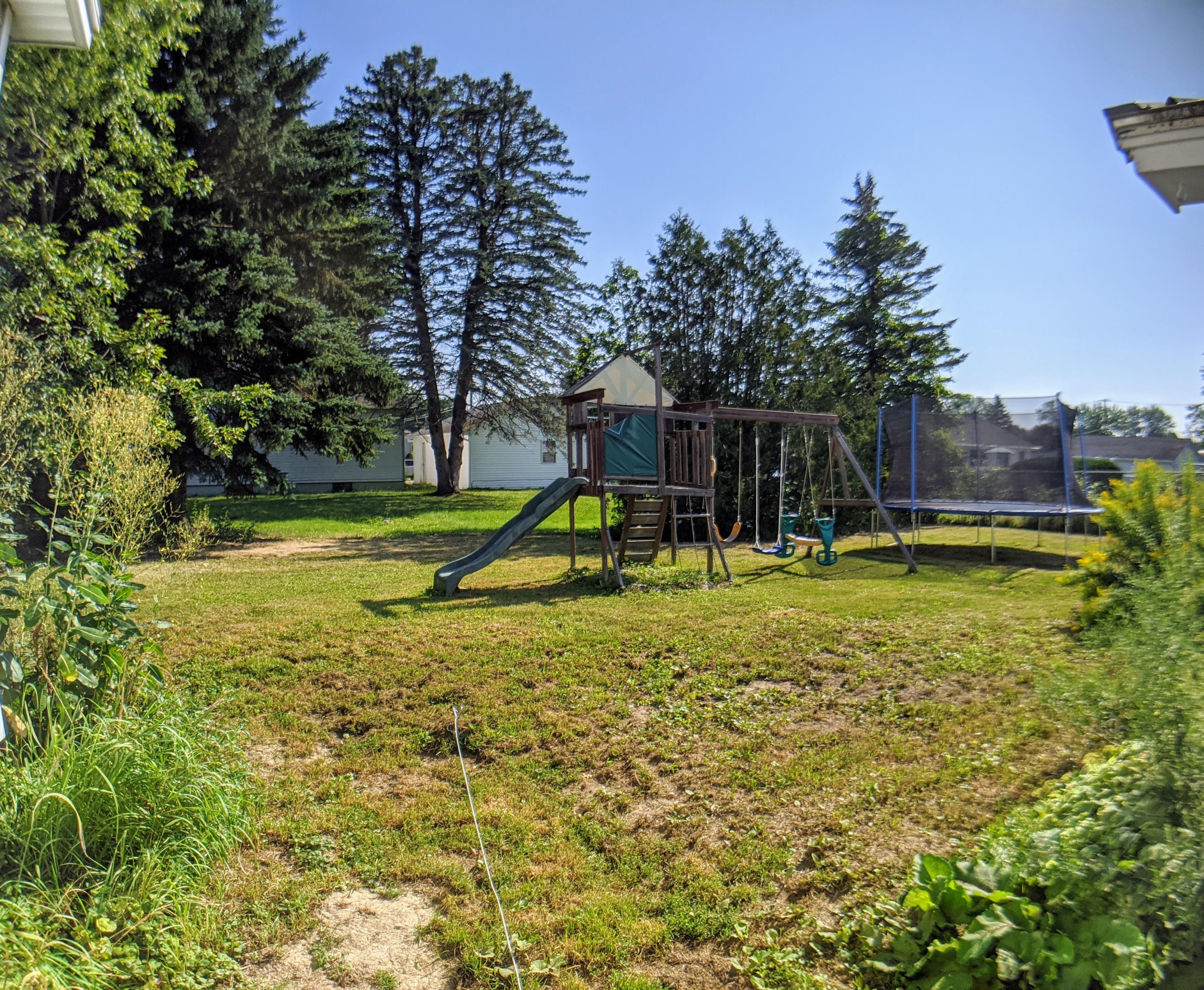 25 Ralph Street Bangor, ME 04401 - Photo 17 of 19 Yard from path next to house