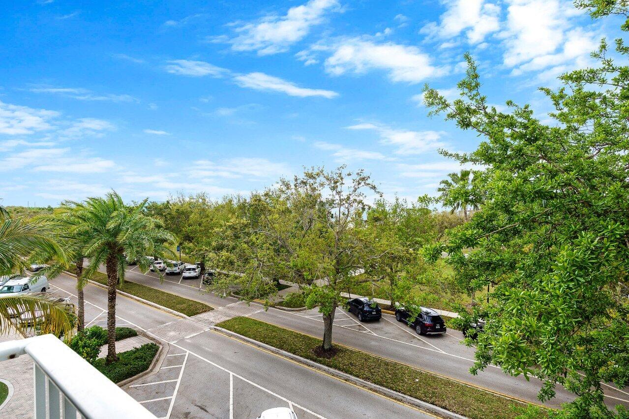 1209 Main Street, Unit 302 Jupiter, FL 33458 - Photo 24 of 35 a view of a street with sitting area