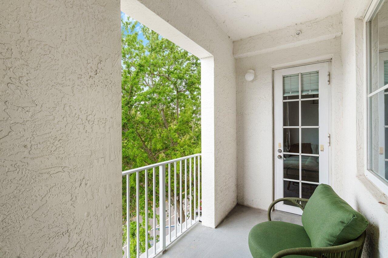 1209 Main Street, Unit 302 Jupiter, FL 33458 - Photo 25 of 35 a balcony with outdoor space