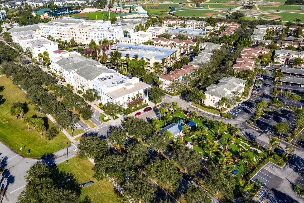 1209 Main Street, Unit 302 Jupiter, FL 33458 - Photo 27 of 35 an aerial view of residential houses with outdoor space