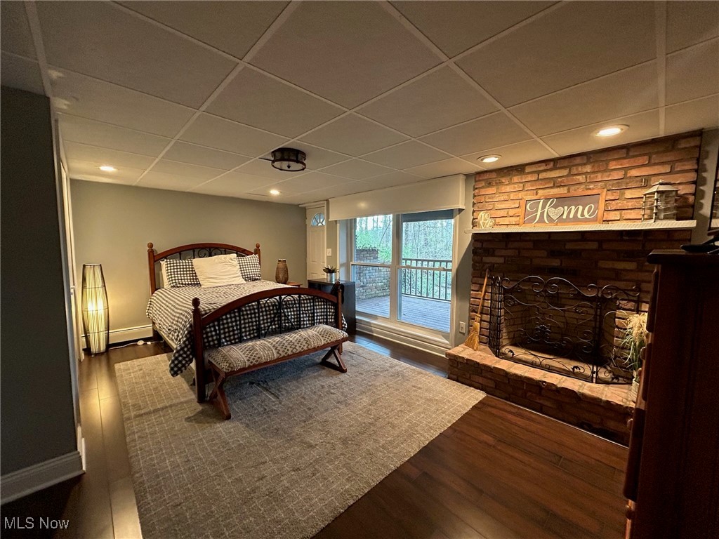 866 Beechers Brook Road Cleveland, OH 44143 - Photo 13 of 32 Bedroom 3 in lower level featuring a fireplace w/gas line and deck access!