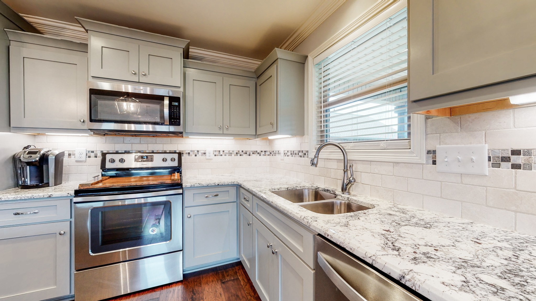 6620 Murfreesboro Road Lebanon, TN 37090 - Photo 13 of 55 a kitchen with granite countertop a sink and a stove top oven