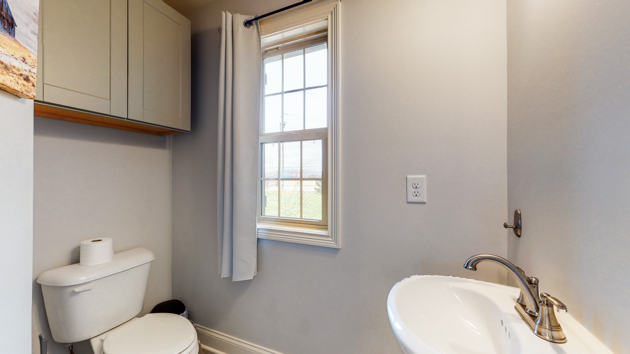 6620 Murfreesboro Road Lebanon, TN 37090 - Photo 18 of 55 a bathroom with a toilet sink and mirror