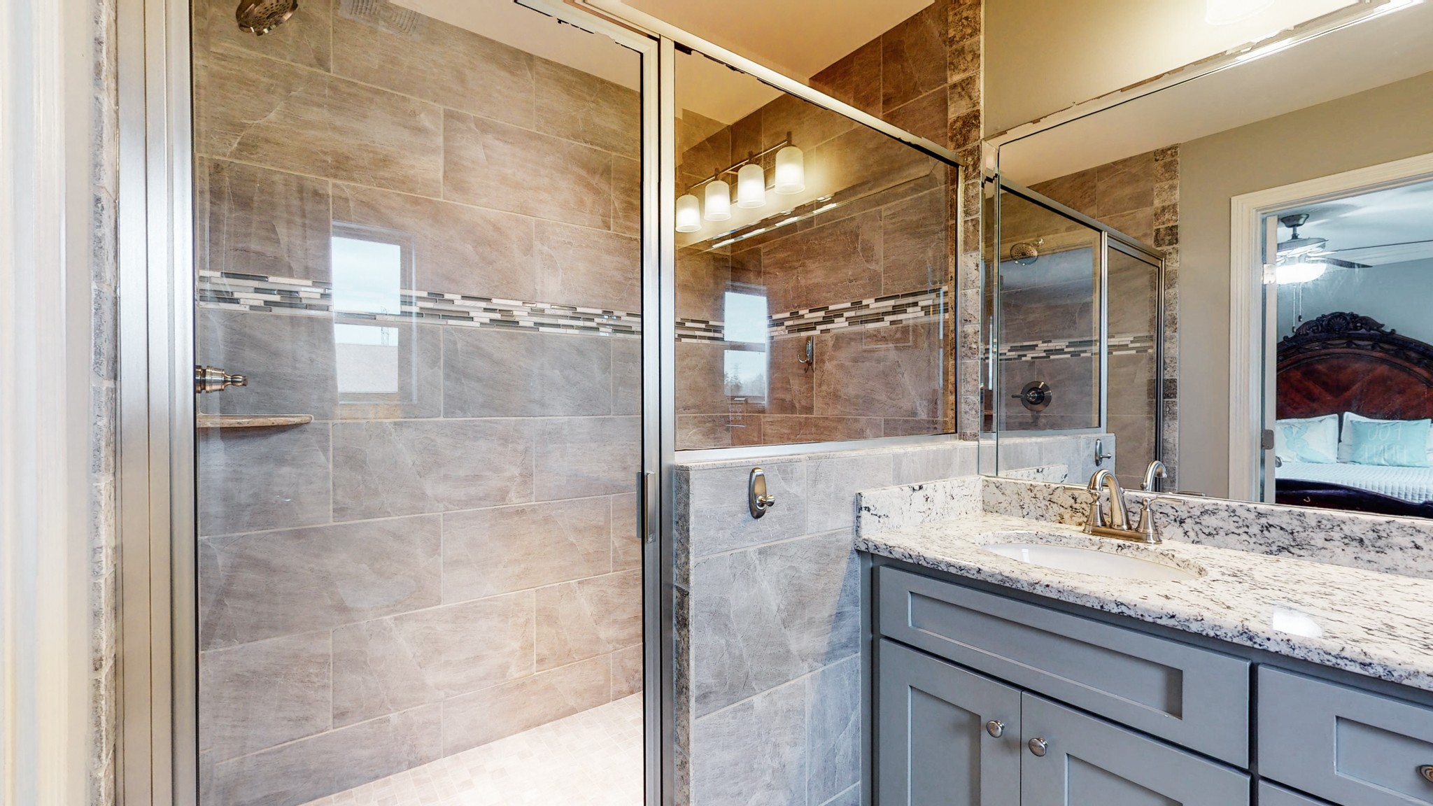 6620 Murfreesboro Road Lebanon, TN 37090 - Photo 25 of 55 a bathroom with a granite countertop shower mirror and a sink