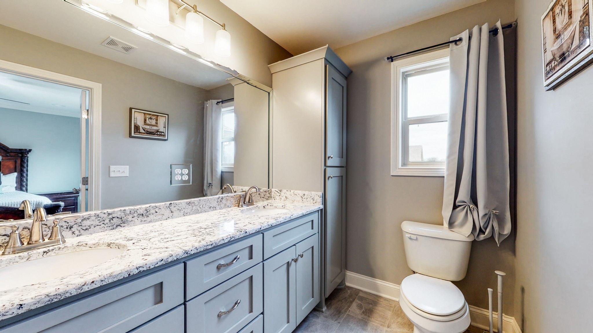 6620 Murfreesboro Road Lebanon, TN 37090 - Photo 26 of 55 a bathroom with a granite countertop sink toilet and mirror