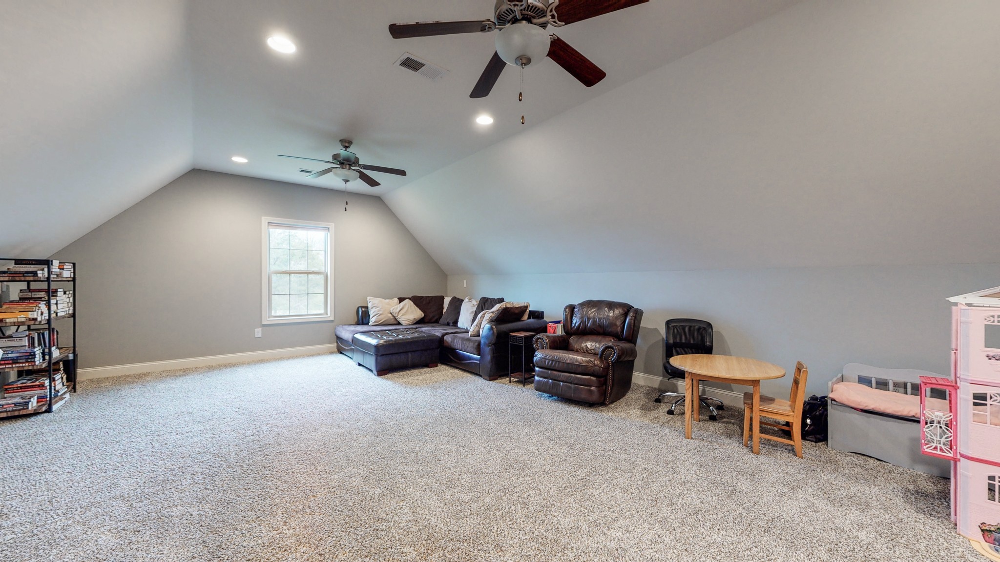 6620 Murfreesboro Road Lebanon, TN 37090 - Photo 29 of 55 a living room with furniture and a chandelier