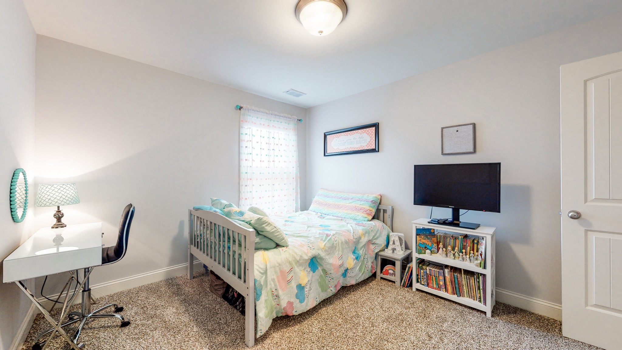 6620 Murfreesboro Road Lebanon, TN 37090 - Photo 34 of 55 a bedroom with a bed and a flat screen tv