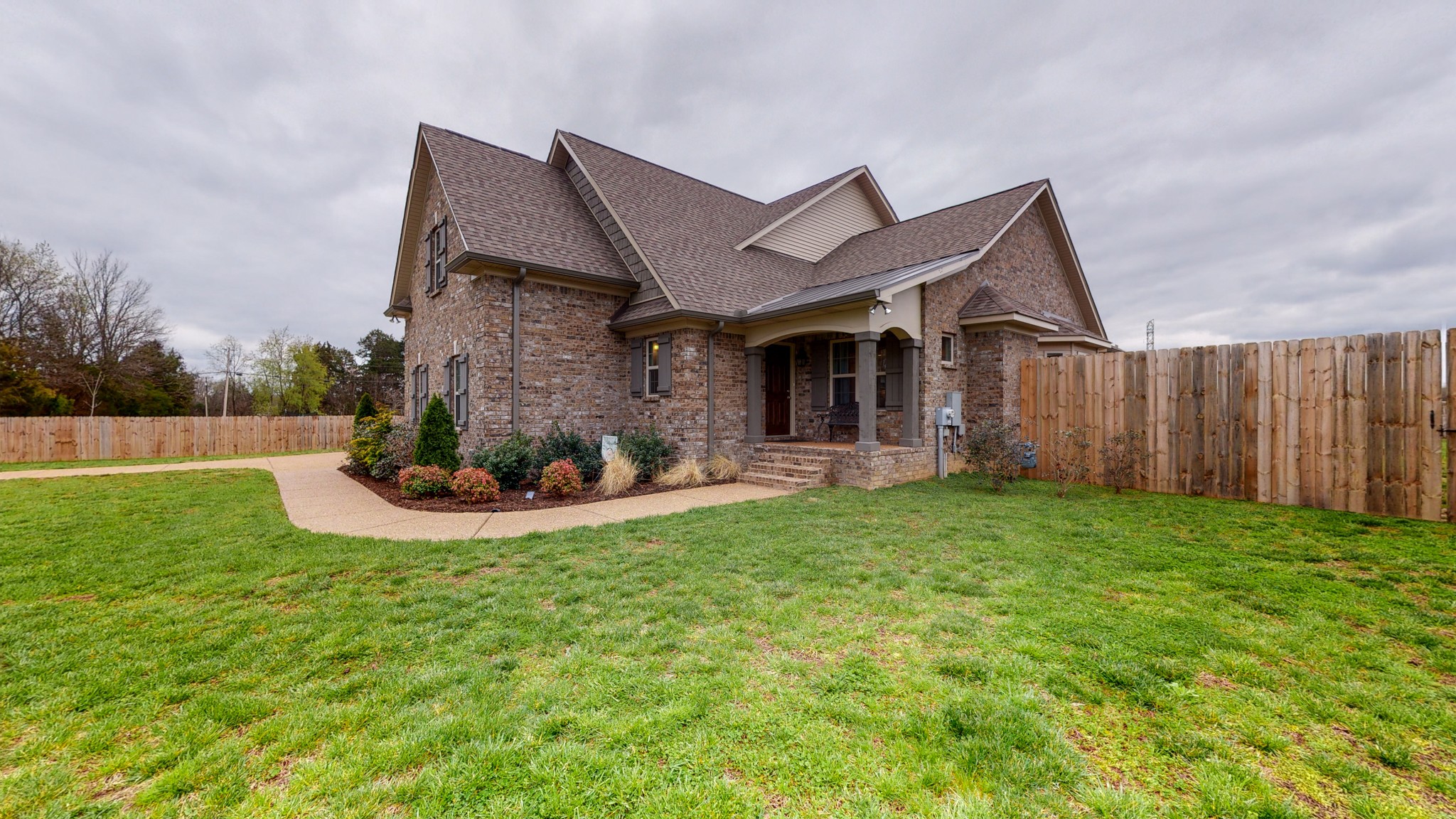 6620 Murfreesboro Road Lebanon, TN 37090 - Photo 39 of 55 a front view of a house with garden