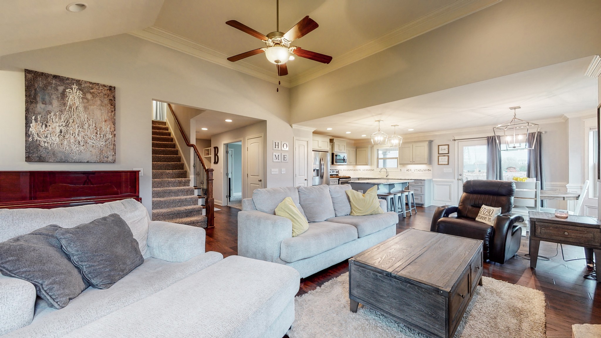 6620 Murfreesboro Road Lebanon, TN 37090 - Photo 4 of 55 a living room with furniture ceiling fan and a rug