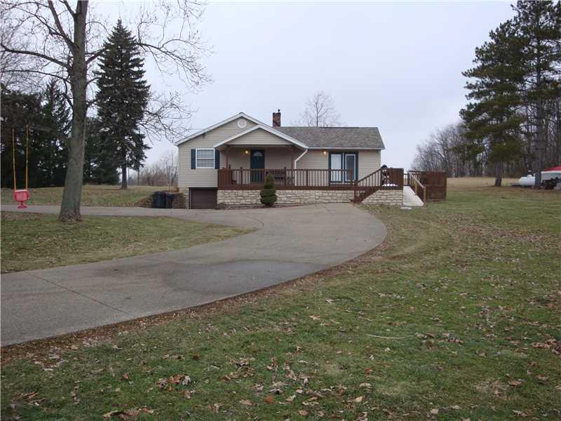 438 Ridge Road Brownsville, PA 15417 - Photo 2 of 13 Exterior Front. Large mature tree "" PERFECT FOR A TREE SWING"" just look at this yard...... nice deck....