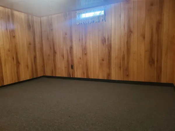a view of a livingroom with wooden floor