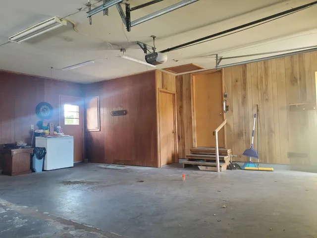 an empty room with closet area