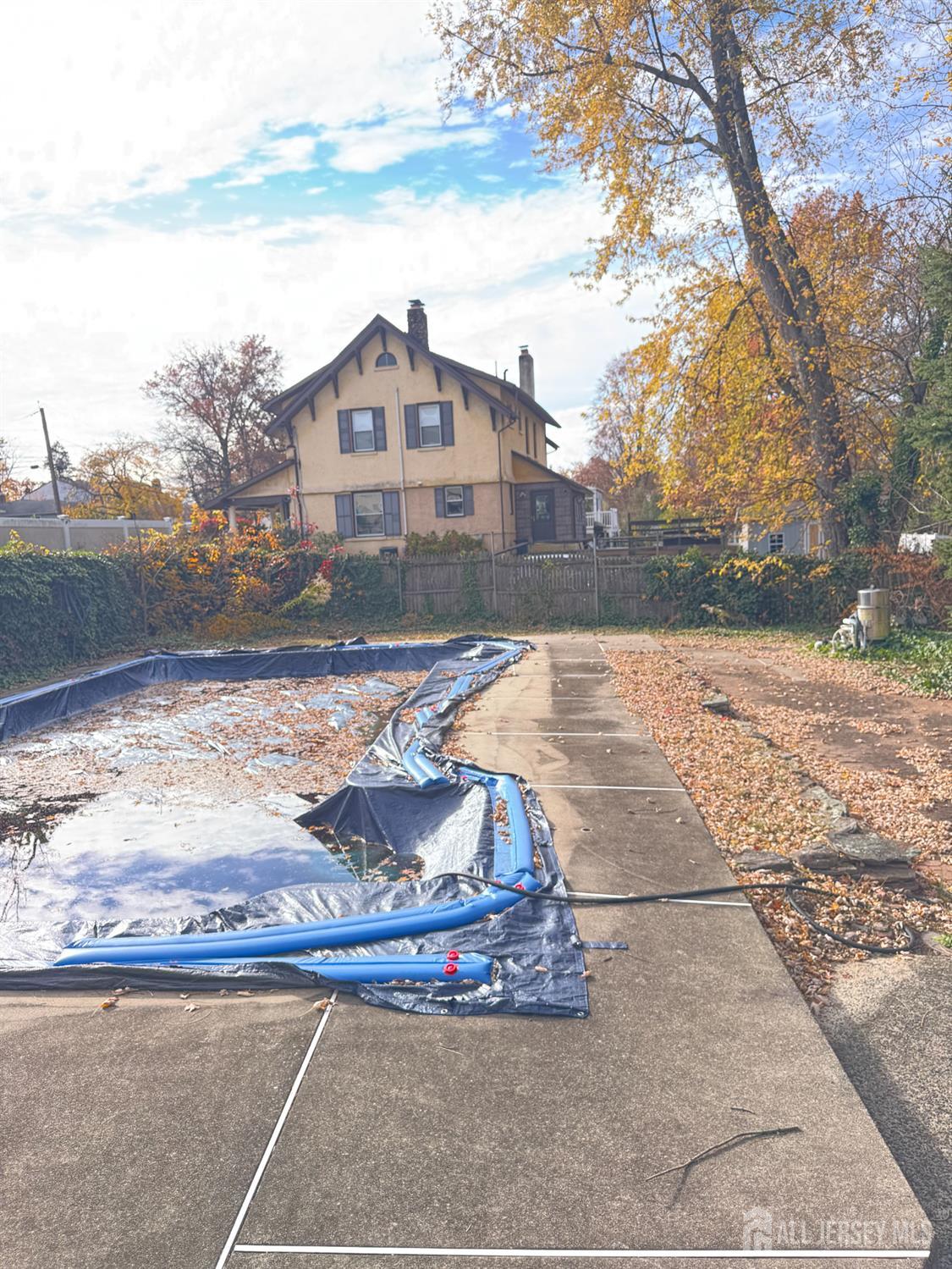 145 Dover Road Colonia, NJ 07067 - Photo 11 of 12 a front view of a house with a yard