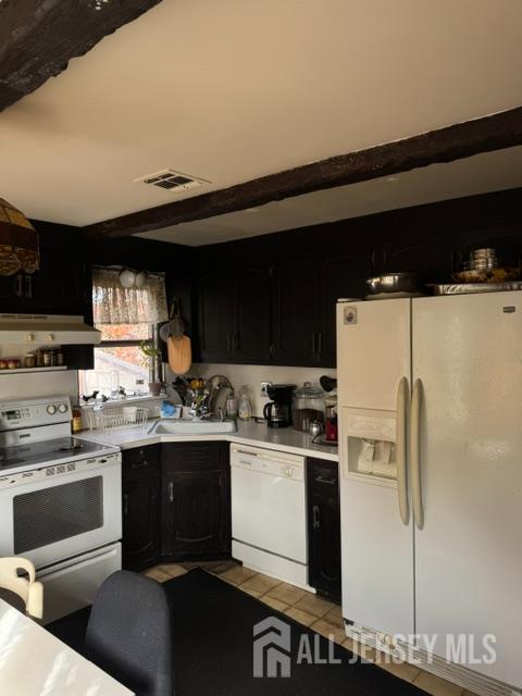 145 Dover Road Colonia, NJ 07067 - Photo 3 of 12 a kitchen with stainless steel appliances a stove and a refrigerator