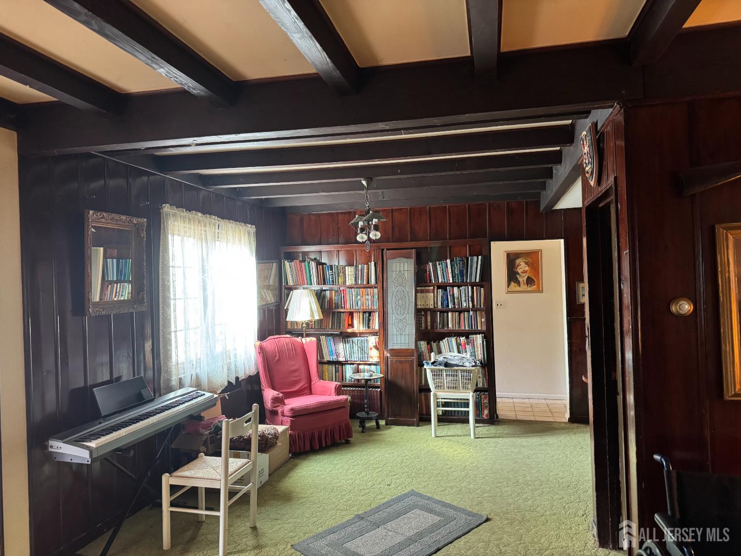 145 Dover Road Colonia, NJ 07067 - Photo 5 of 12 a living room with furniture and a window