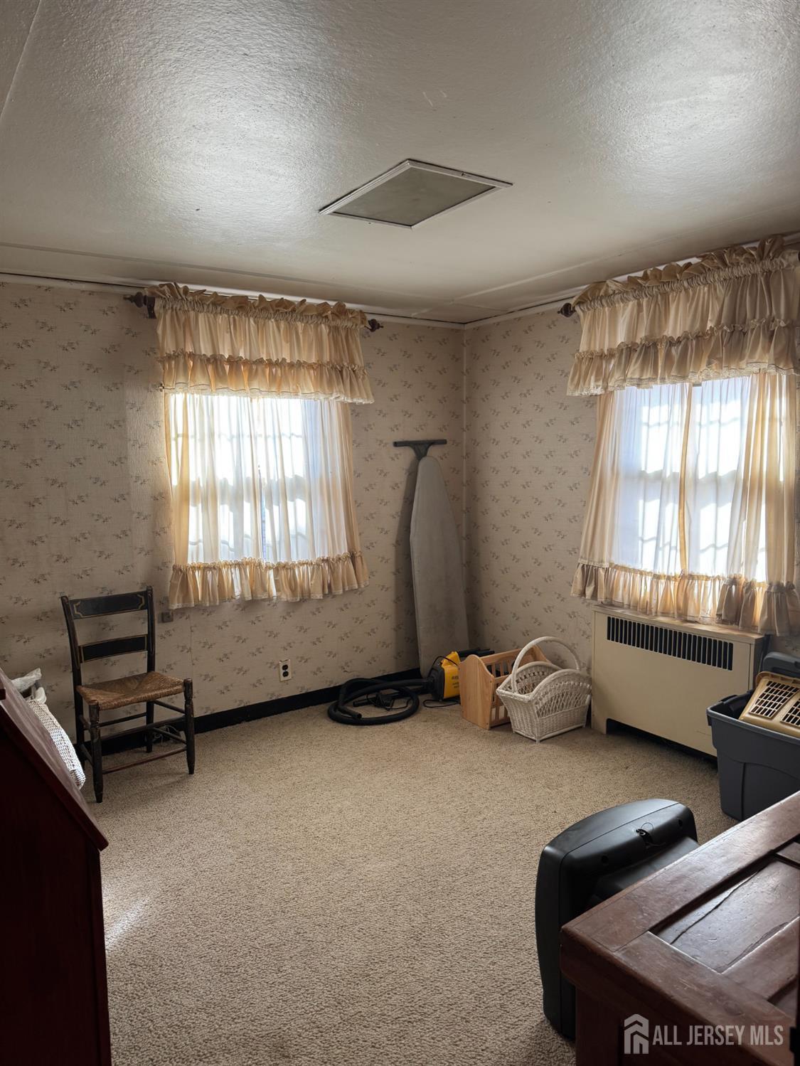 145 Dover Road Colonia, NJ 07067 - Photo 9 of 12 an empty room with windows