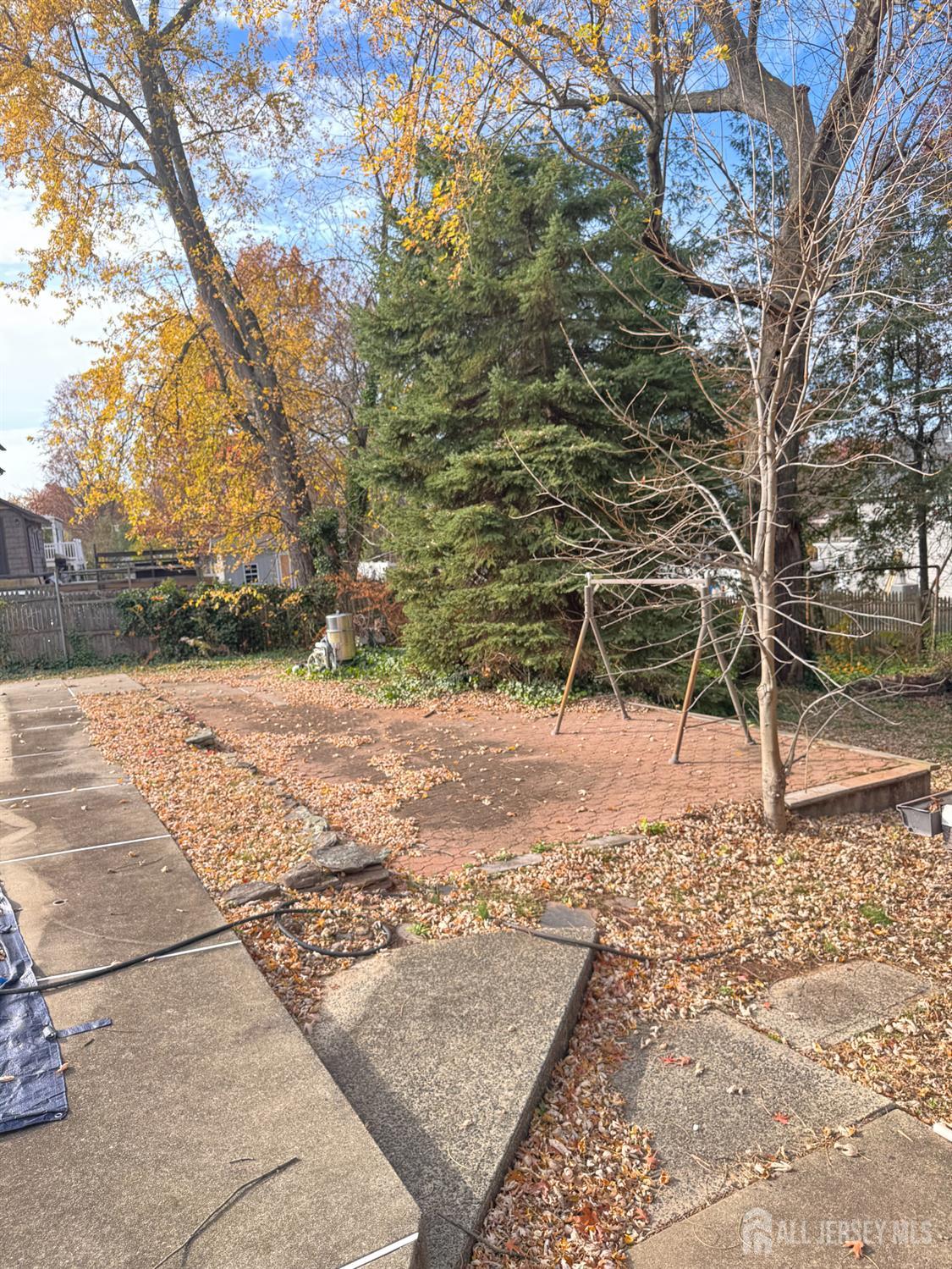 145 Dover Road Colonia, NJ 07067 - Photo 10 of 12 a view of a yard with a tree
