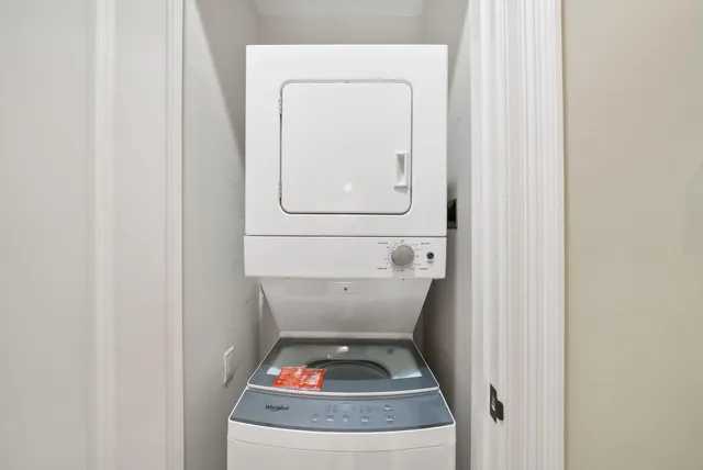 an aerial view of a house with a lake view