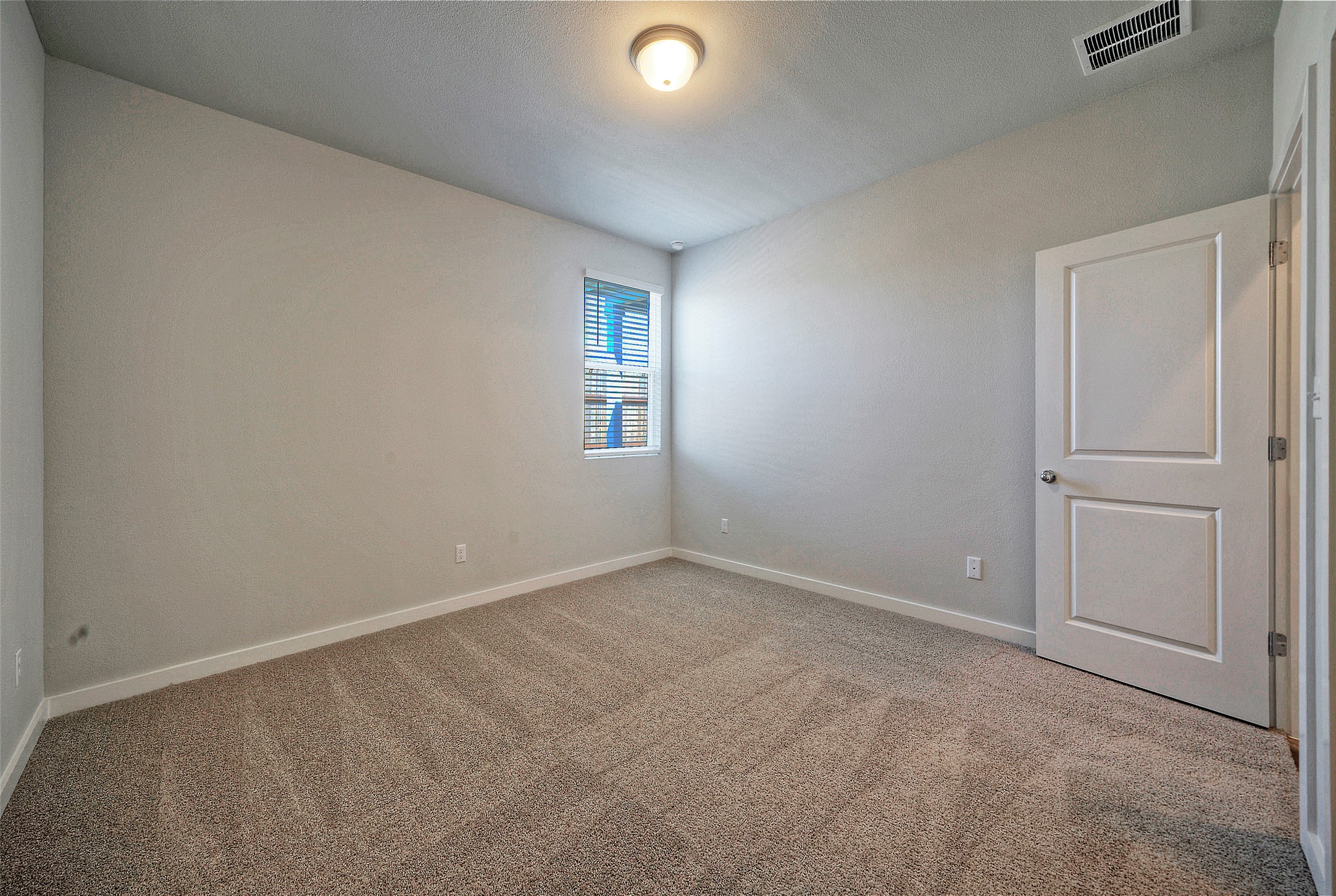 2312 Castillo Drive Round Rock, TX 78664 - Photo 11 of 21 an empty room with windows and closet
