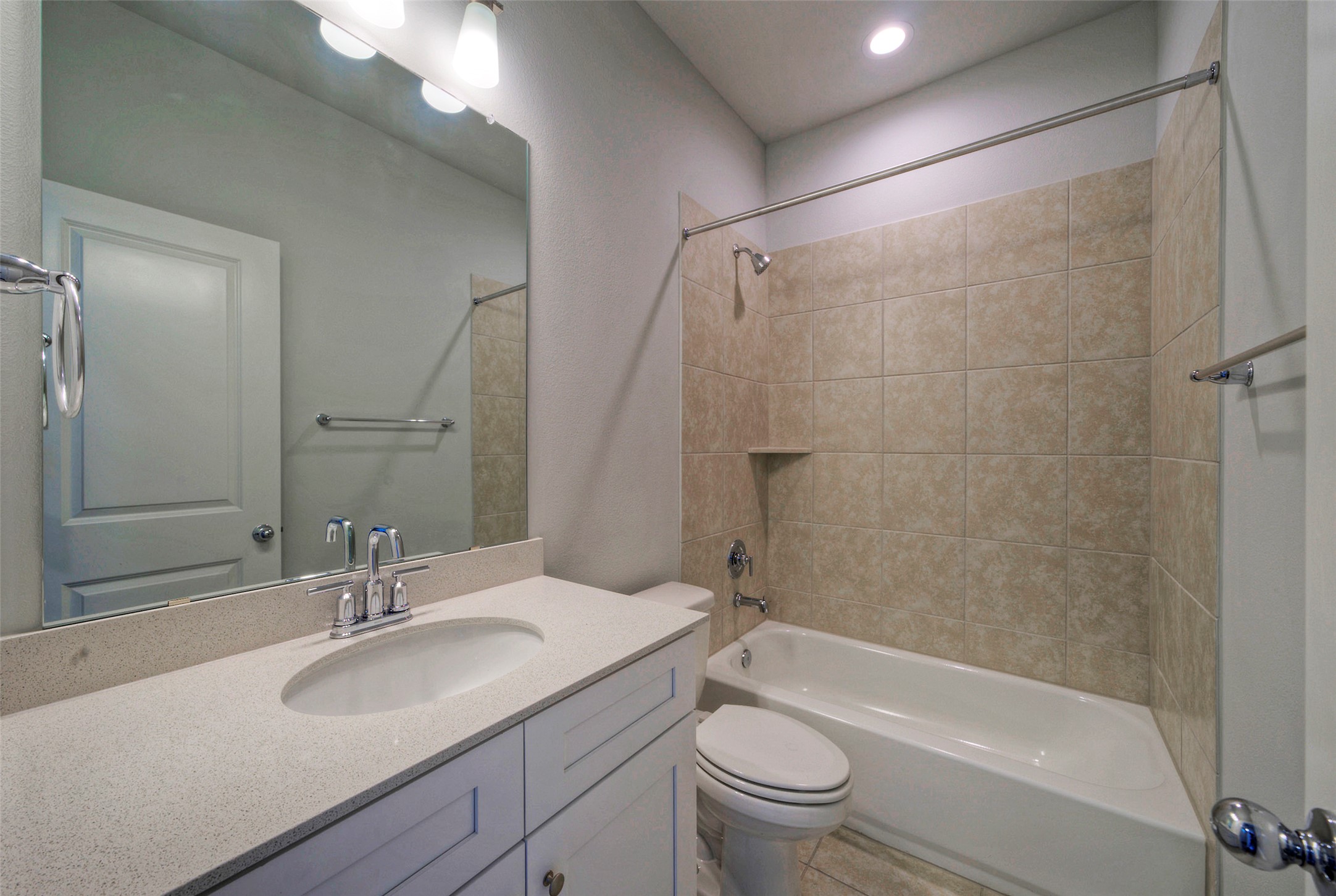 2312 Castillo Drive Round Rock, TX 78664 - Photo 18 of 21 a bathroom with a sink toilet and shower