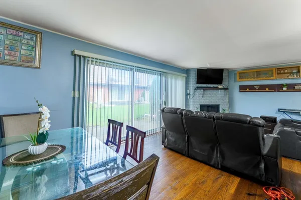 a kitchen with stainless steel appliances granite countertop a stove and a refrigerator