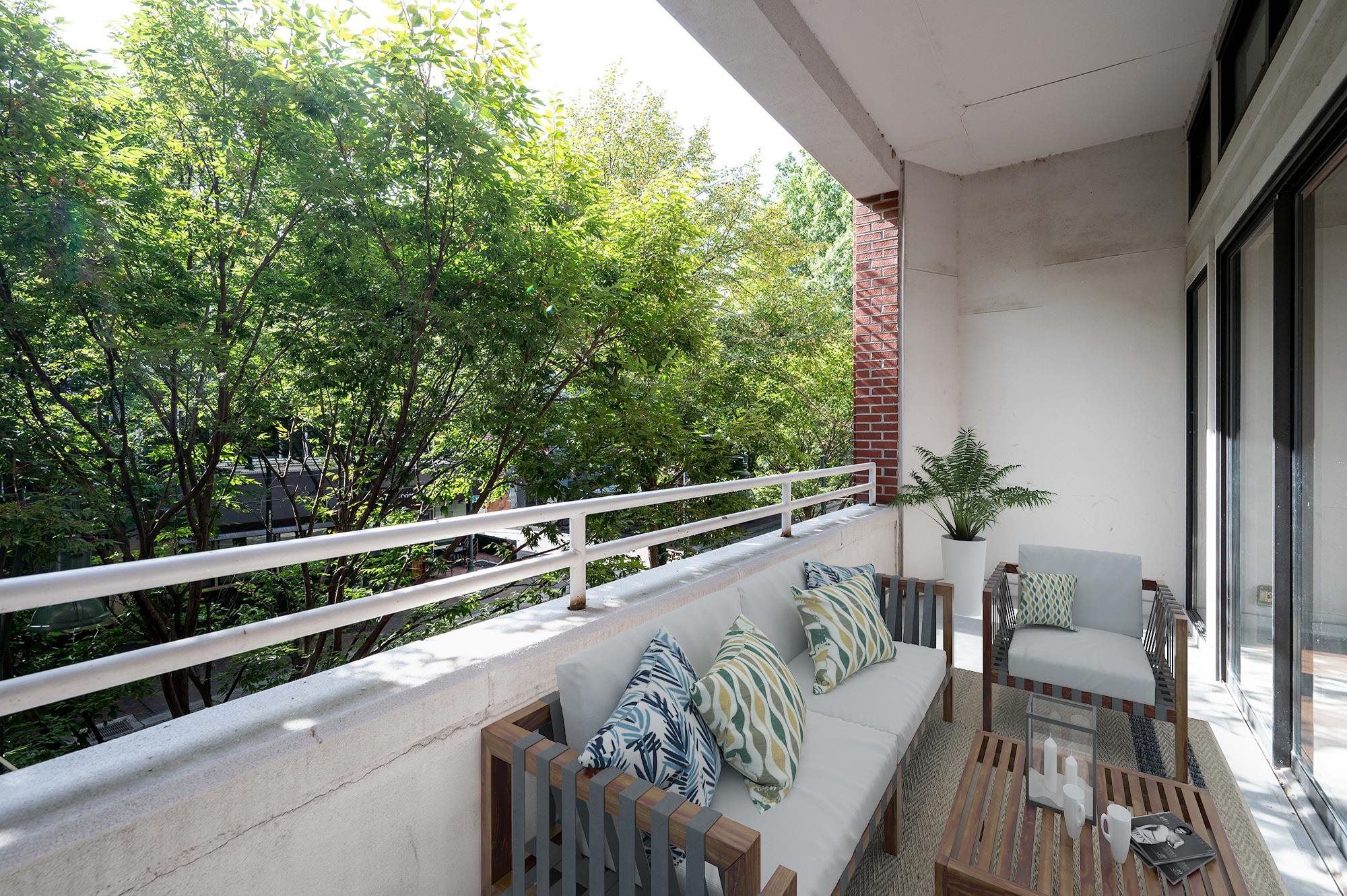 95 South Main Street, Unit 204 Memphis, TN 38103 - Photo 14 of 18 a view of a balcony with furniture