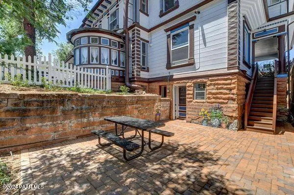 a view of a bench in the patio