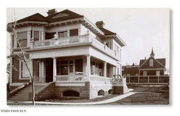 a view of a street with cars