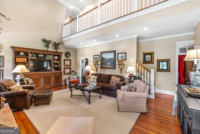 a kitchen with stainless steel appliances granite countertop a stove and a refrigerator