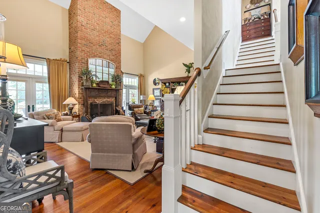 a view of a dining room with furniture and window